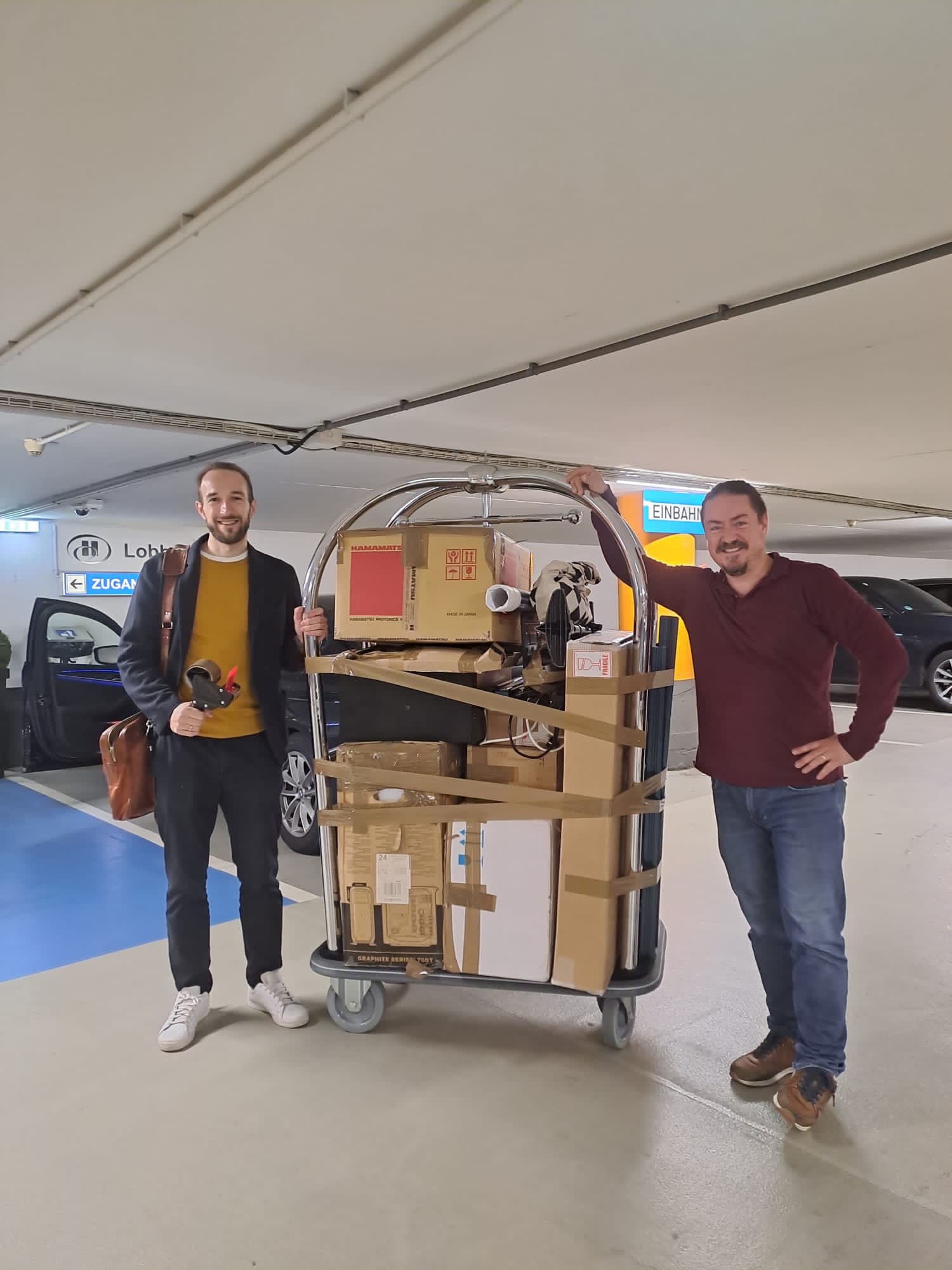 DeepEn team loading equipment for the DeepEn One demonstration at IEEE Sensors 2023 in Vienna.