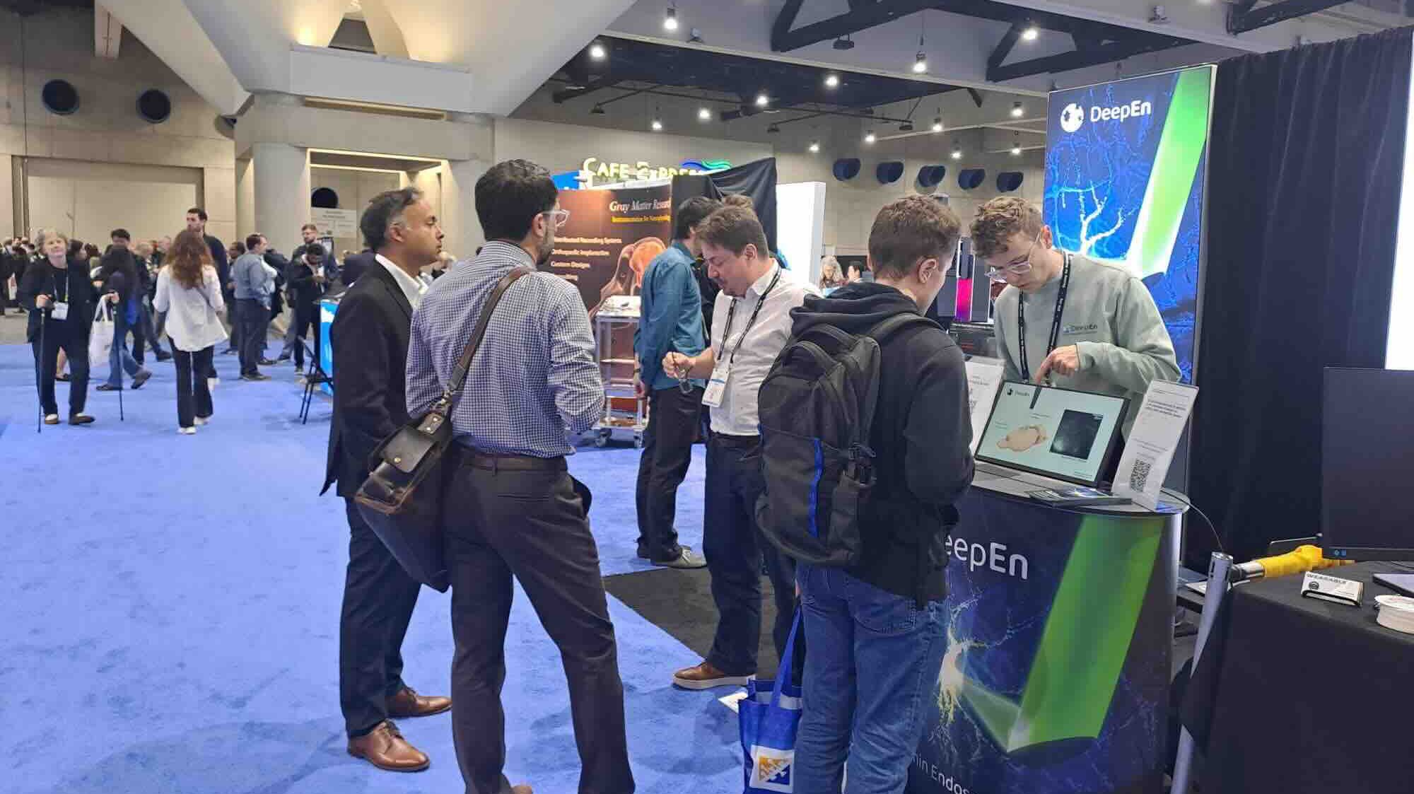 Visitors at booth of DeepEn at SfN 2025